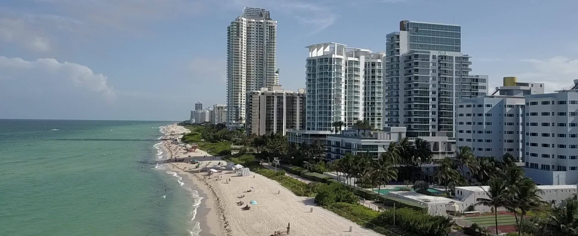 Aerial drone view of Miami Beach coastline and shoreline